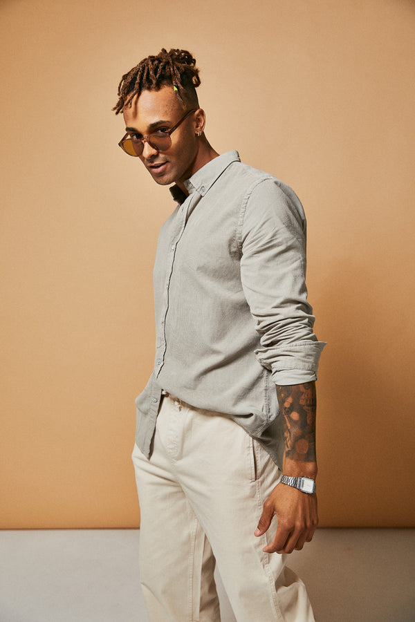 Male model wearing brown polarised sunglasses